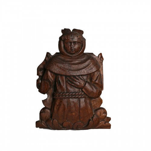 Élément en bois sculpté représentant un moine. XVIe - XVIIe siècle. Pays-Bas