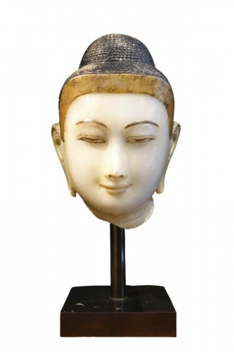 A huge 18th-19th c. marble Buddha head
