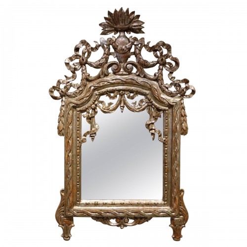 18th century Mirror in carved wood and silver plated wood