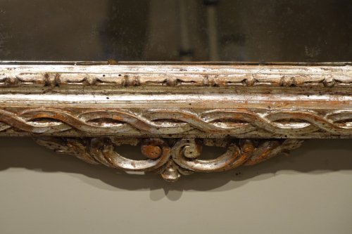 18th century - 18th century Mirror in carved wood and silver plated wood