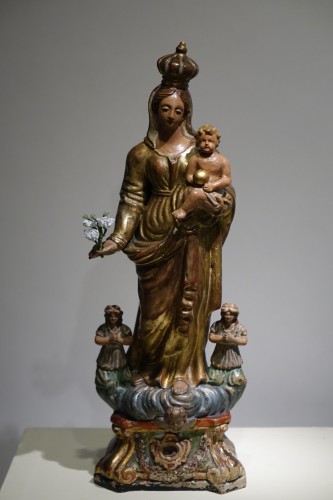 Antiquités - A  gilt polychrome terracotta Virgin and Child , Italy, 18th c.