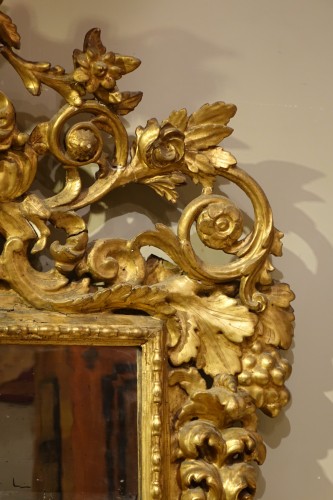 Grand miroir baroque en bois sculpté et doré,Italie, 18e siècle - Régence
