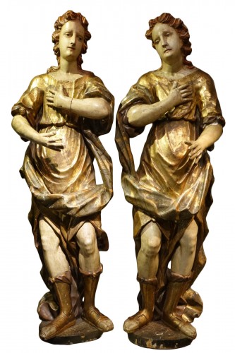 Large pair of angels(?) in gilt and polychromed wood, Italy, 17th century.