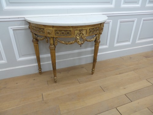 A Louis XVI Half-moon console - 