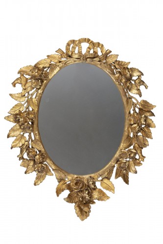 Miroir en bois sculpté et doré