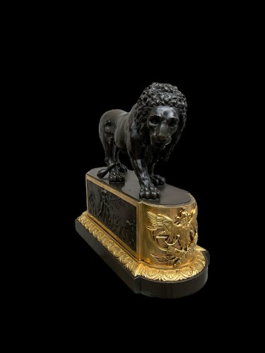 Pair of lions in bronze brown and gilded - 