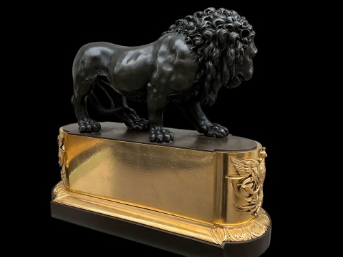 Antiquités - Pair of lions in bronze brown and gilded
