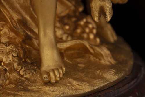 Antiquités - Gilt-bronze group depicting “The Bacchantes after Clodion”,
