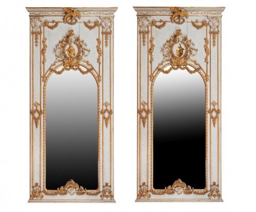 Pair of carved, laquered and gilded wooden mirrors 