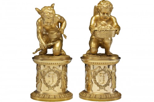 Pair of bronze Putti 