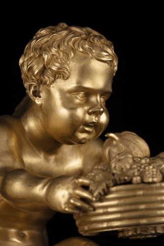 Antiquités - Paire de Putti en bronze doré