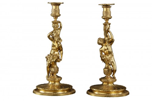 Pair of Louis XV candlesticks, model of Corneille van Cléve