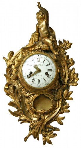 A Louis XV ormolu gilt bronze cartel clock - mechanism 9th century