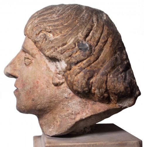 11th to 15th century - Head of a man in polychrome limestone, fifteenth century