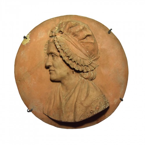 Médaillon d'époque révolutionnaire daté 1792, représentant une femme à bonnet