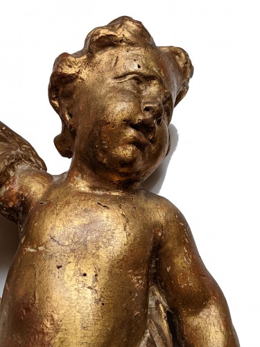 Antiquités - Paire d'anges rococo en bois doré du XVIIIe siècle