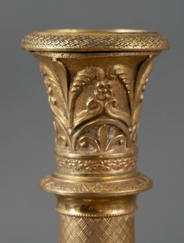 Luminaires Bougeoirs et Chandeliers - Quatre bougeoirs Charles X en bronze doré