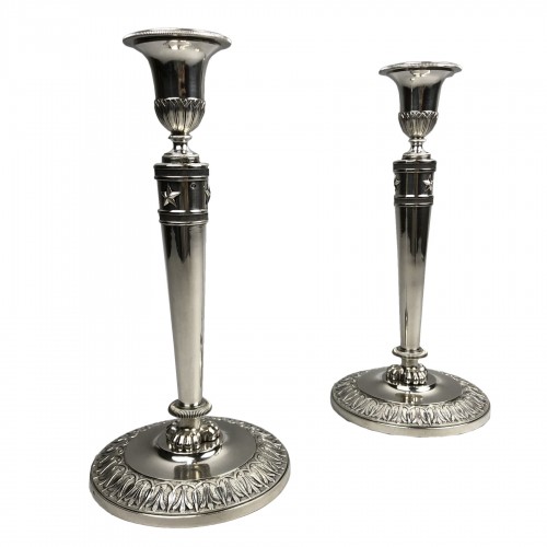 Pair of solid silver flambeaux of the Empire period