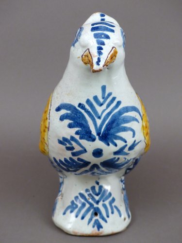 Céramiques, Porcelaines  - Un grand pigeon de faîtage, en faïence de Nevers, du XVIIIe siècle