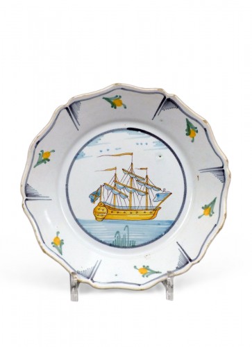 A Louis XV faience plate from Nevers