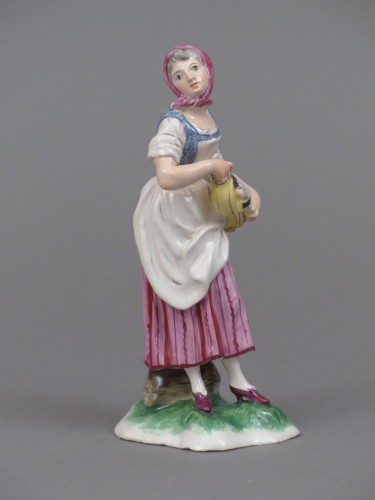 Joueuse de vielle à roue, en faïence de Niderviller, XVIIIe siècle - Céramiques, Porcelaines Style Louis XV