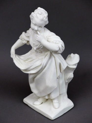 Céramiques, Porcelaines  - La petite fille au tablier, biscuit de Sèvres 18e siècle
