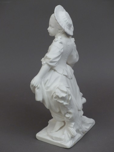 Antiquités - La danseuse et le joueur de musette, biscuits en porcelaine tendre Sèvres XVIIIe siècle.