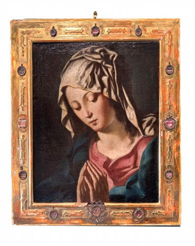 Vierge du XVIIe siècle dans son cadre reliquaires