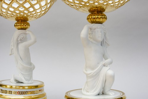 Empire - Pair of Empire open-worked porcelain baskets, white bisque children