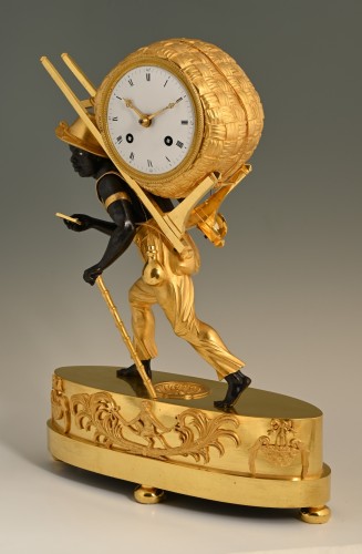 Horology  - A French empire &#039;au bon sauvage&#039; mantel clock Portefaix