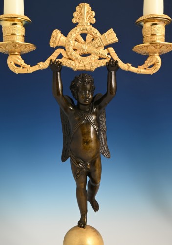 Empire - Paire de chandeliers en bronze doré et patiné vers 1820