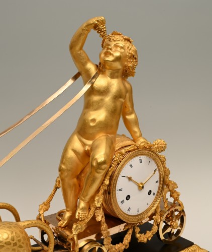 XIXe siècle - Bacchus assis sur un tonneau - Pendule de cheminée Empire