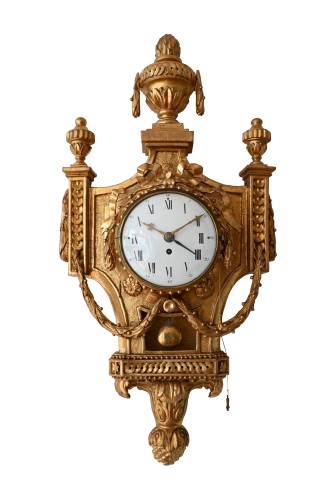 A carved gilded wooden Cartel with alarm function