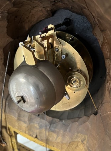 Horology  - A carved gilded wooden Cartel with alarm function