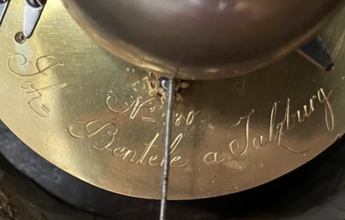 A carved gilded wooden Cartel with alarm function - 