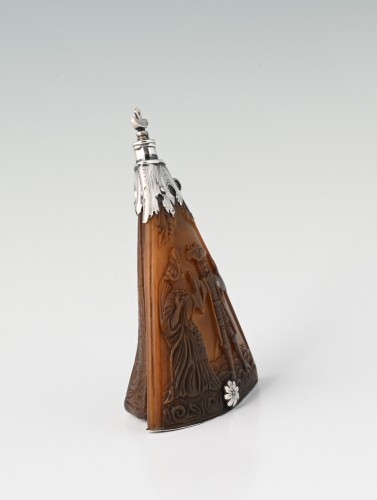  - A 17th-century Dutch powder horn decorated with an erotic scene