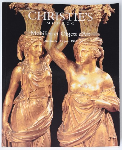 Empire - Une paire de bougeoirs Empire en bronze doré et patiné
