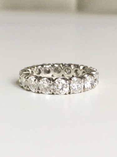 20th century - American wedding band in platinum and diamonds