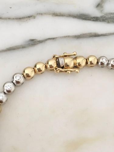 XXe siècle - Bracelet en or jaune et blanc diamants