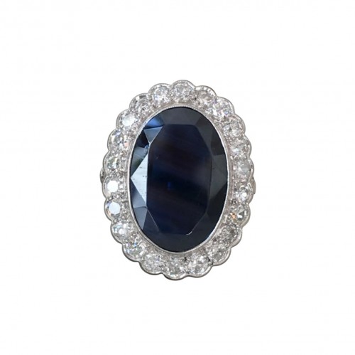 Importante bague marguerite en or blanc saphir et diamants