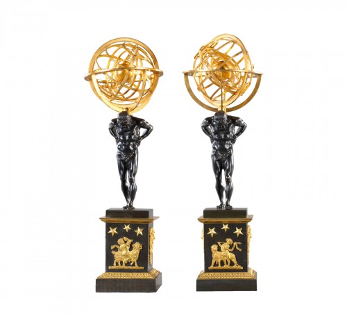 Pair of armillary spheres supported by Atlases
