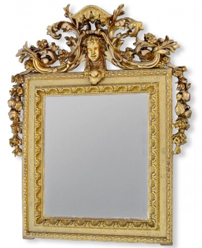 Miroir Napoléon III en bois sculpté et doré