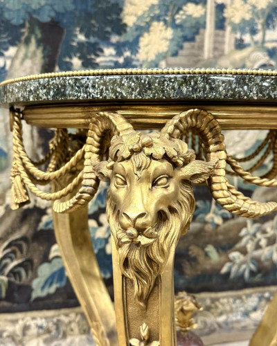 Antiquités - ram pedestal table In gilt bronze, marble and porphyry. Louis XVI style