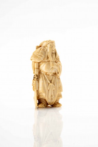 Asian Works of Art  - A Japanese Ivory Netsuke Depicting General Guan Yu