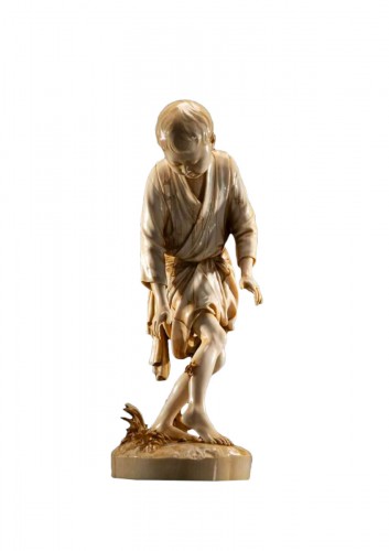 A Japanese Tokyo school ivory okimono depicting a young boy
