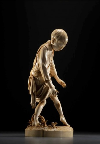 A Japanese Tokyo school ivory okimono depicting a young boy - 