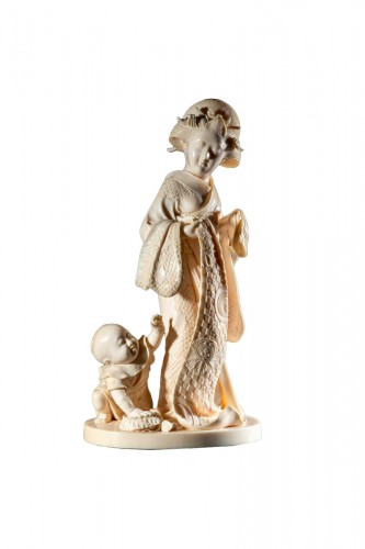 Ivory Okimono From The Tokyo School Depicting A Mother With A Child