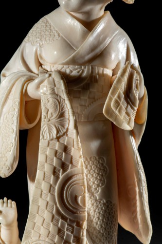 Ivory Okimono From The Tokyo School Depicting A Mother With A Child - 