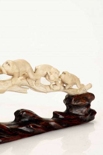 Asian Works of Art  - An Ivory Okimono Depicting A Lively Family Of Monkeys On A Long Branch