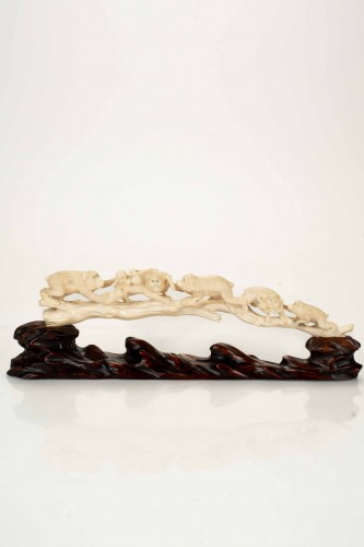 An Ivory Okimono Depicting A Lively Family Of Monkeys On A Long Branch - 